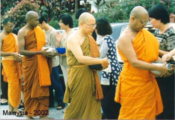 2002 - December - going Pindapata at  Ven K Sri Dhammananda nayaka thero's temple at kwalalampur2.jpg